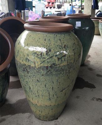 Il verde Archaize i vasi all'aperto rustici rotondi lustrati della pianta